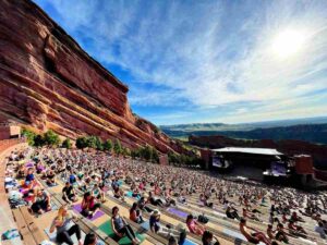 Yoga on the Rocks at Red Rock Ampitheatre for article Summer Events in Denver for newcomers moving to Denver area.