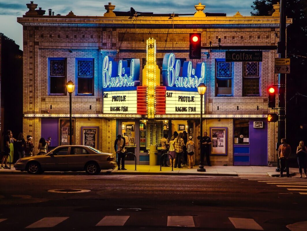 Night photo of the front of the Bluebird theatre in Denver Colorado