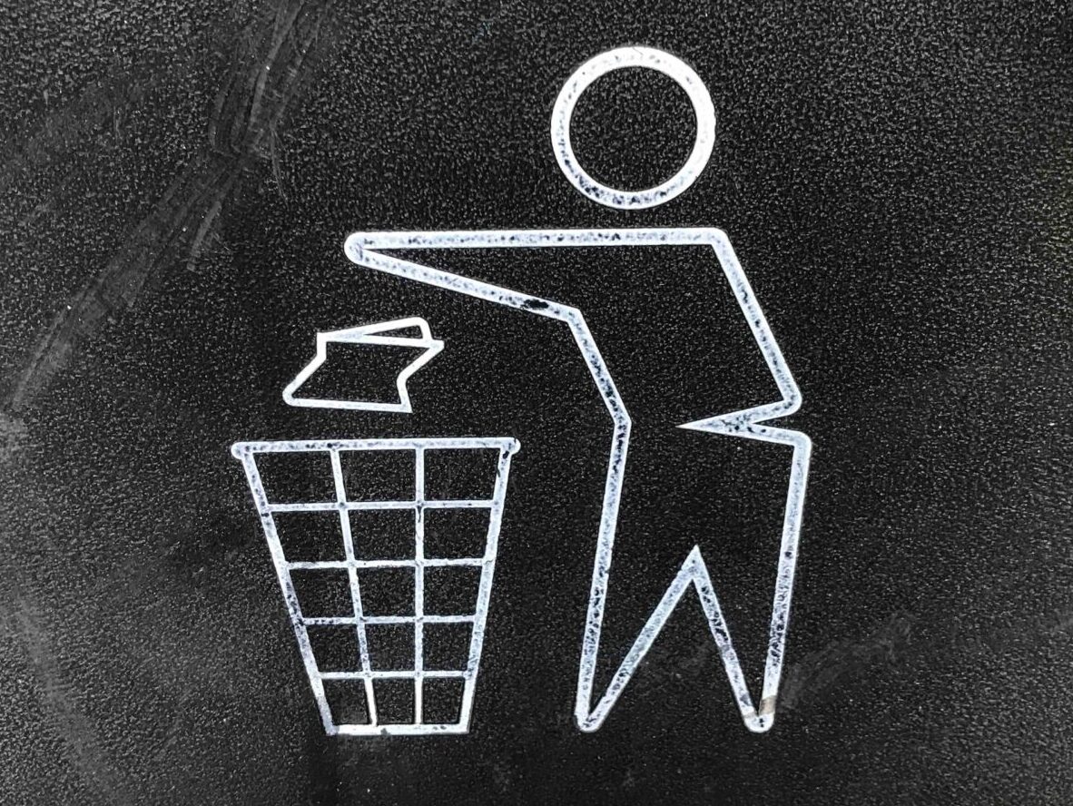 Close up of a recycle garbage bin logo