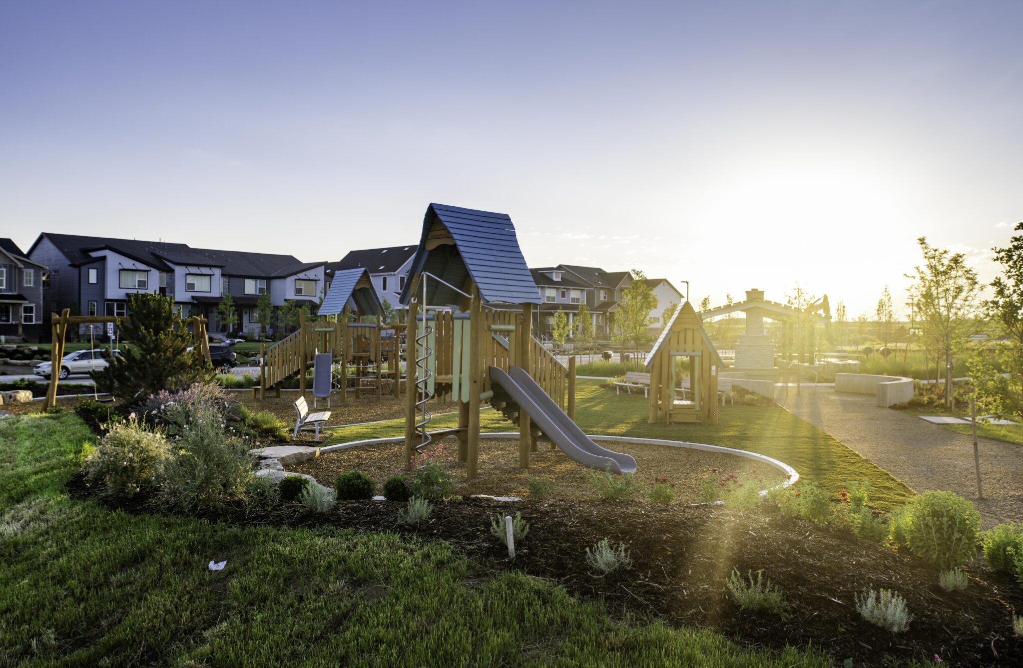 Green spaces at Painted Prairie with children's payset.