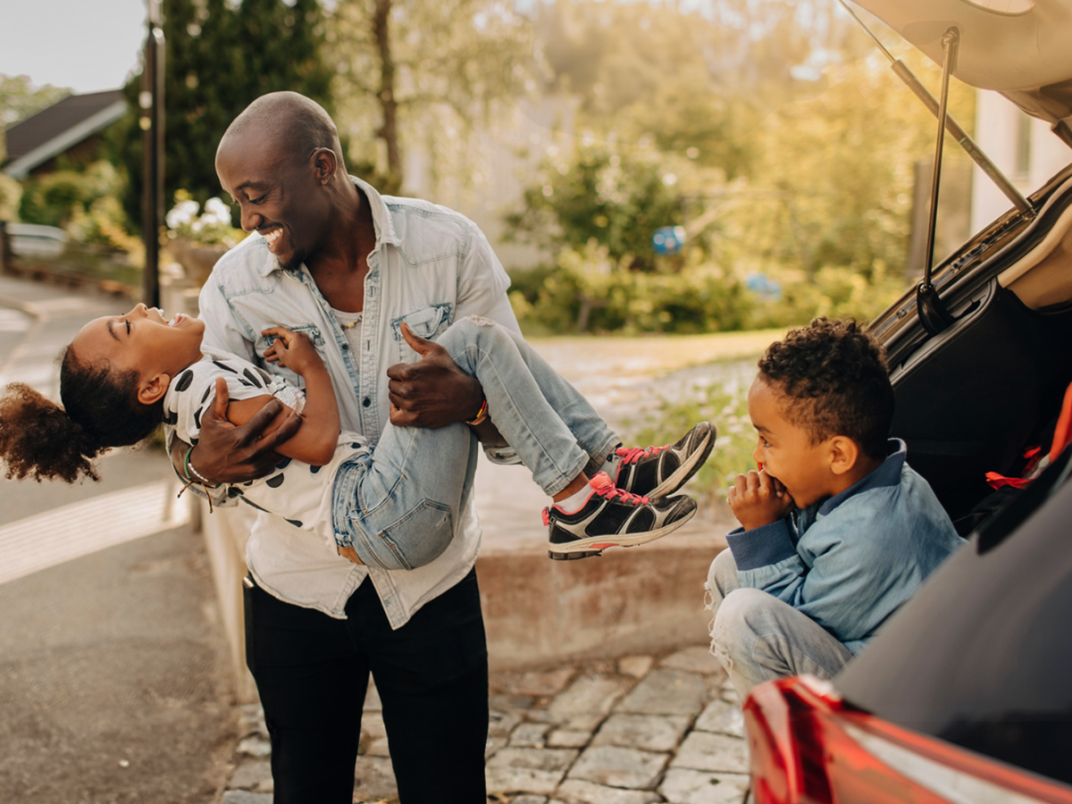 Dad playing with kids.