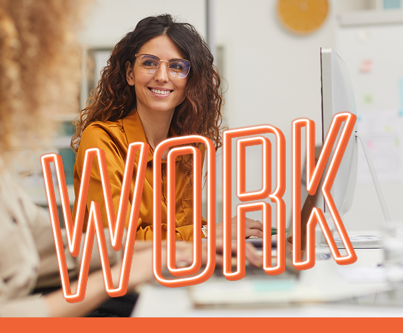 Department Image: WORK. Woman sitting infront of her desk in office