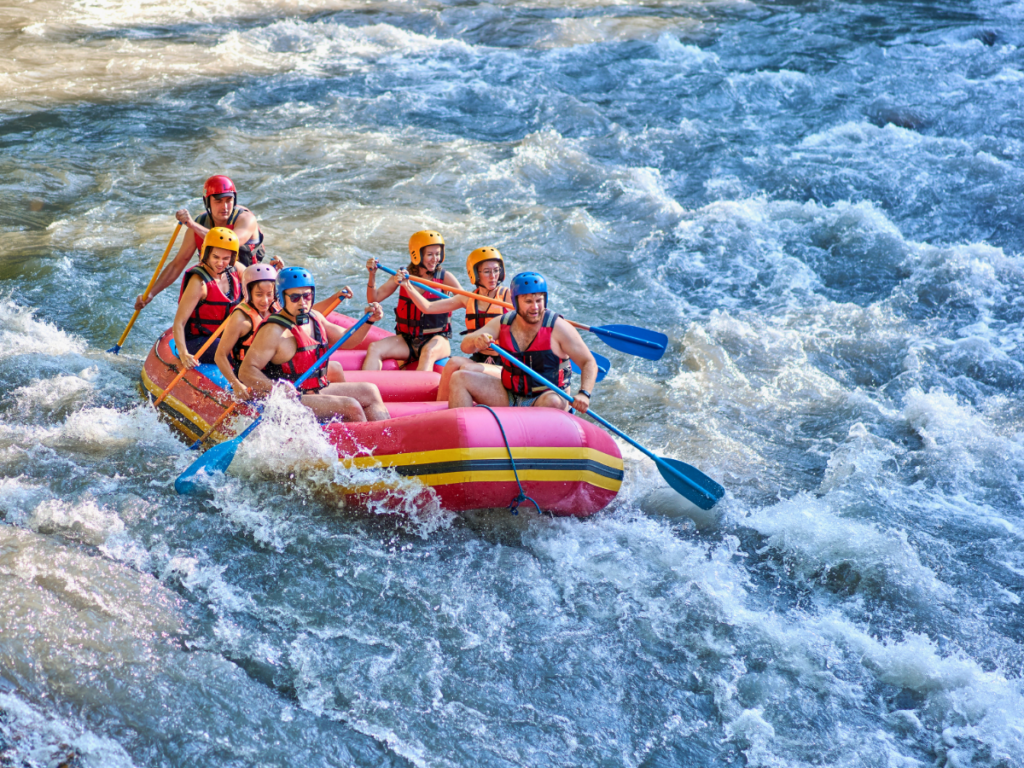 People white water river rafting.