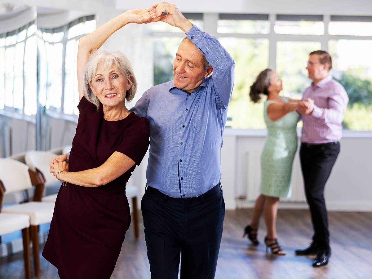 Senior adults learning to dance in a class for article Senior Dance Classes in Denver for seniors retiring in Denver.