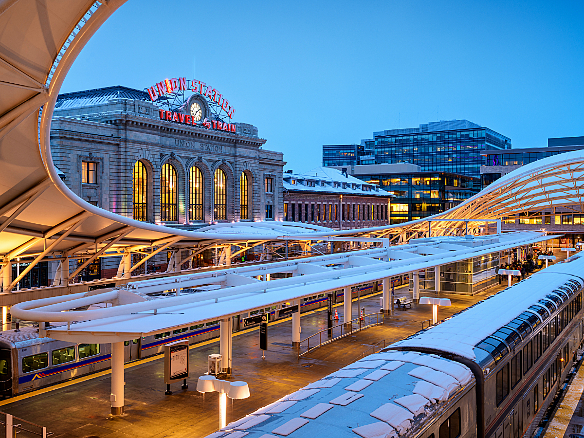 Denver, Colorado, USA - March 13, 2019: Denver's light rail Trains at Union Station for easy transit in winter weather. The central portion of the station was completed in 191 for article Score Big with Easy Transit: Take the Train to Cheer on the Nuggets and Avalanche for newcomers moving to Denver.