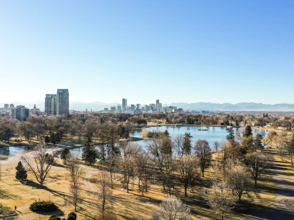 Denver skyline with mountains in the background - Colorado minimum wage