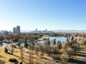 Denver skyline with mountains in the background - Colorado minimum wage