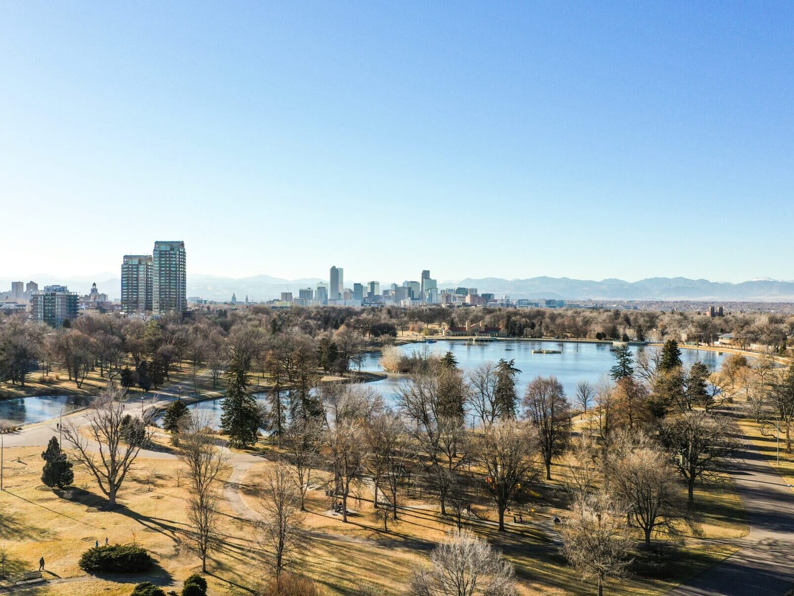 Denver skyline with mountains in the background - Colorado minimum wage